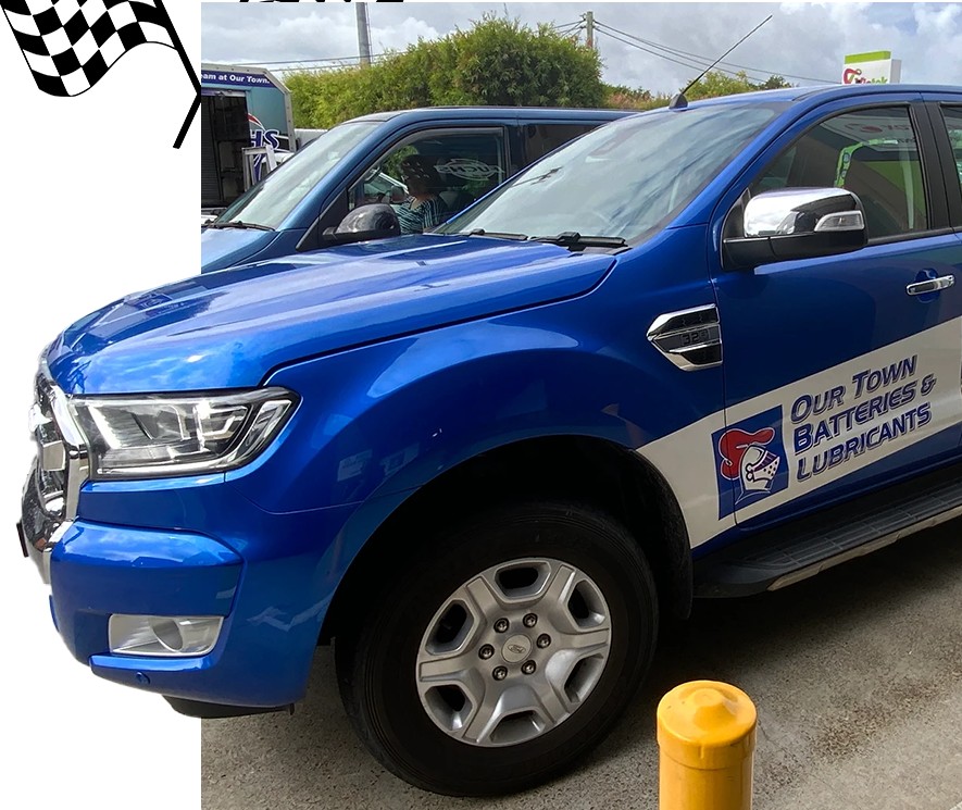 Our Town Batteries and Lubricants blue service vehicle